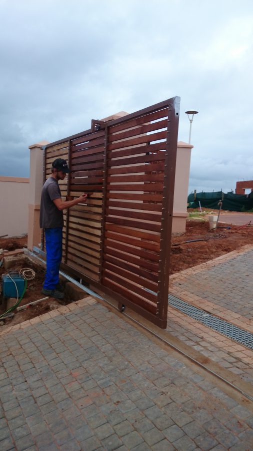 Steel Driveway gate clad in balau