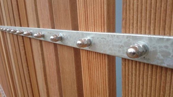 Driveway gate clad in balau